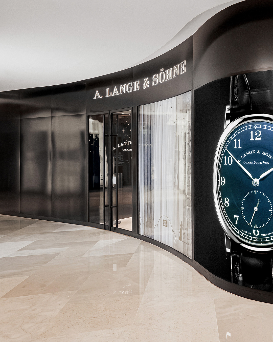 We are unveiling our newly transformed Singapore flagship boutique at ION Orchard. 

A digital “History Wall” in the welcome area introduces visitors to the brand's rich heritage, while cabinets displaying models of all watch families, alongside curated historic pocket watches, highlight Lange's craftsmanship. The boutique's visual identity unfolds in stately black and grey tones, offset by soft white walls, textured finishes, and distinguished furnishings. The spatial layout organically guides customers through the reception and consultation areas. 

A. Lange & Söhne at ION Orchard, Singapore