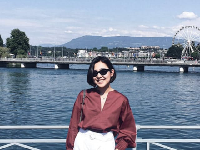 An image of Togzhan Yerzhanova with a river in the background