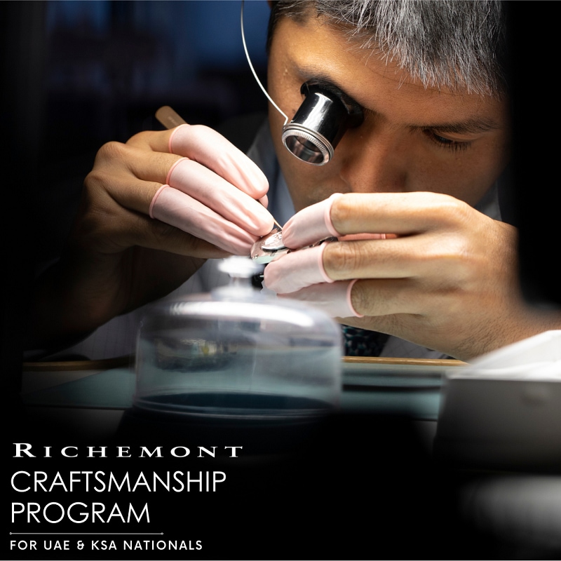 A man assembling a watch