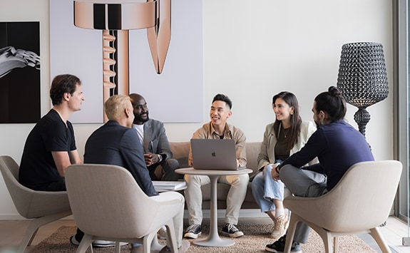 A group of workers having a meeting in the office