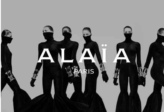 Alaia logo with women in black clothes in the background